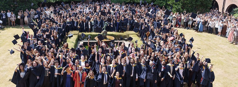 Students doing hat throw